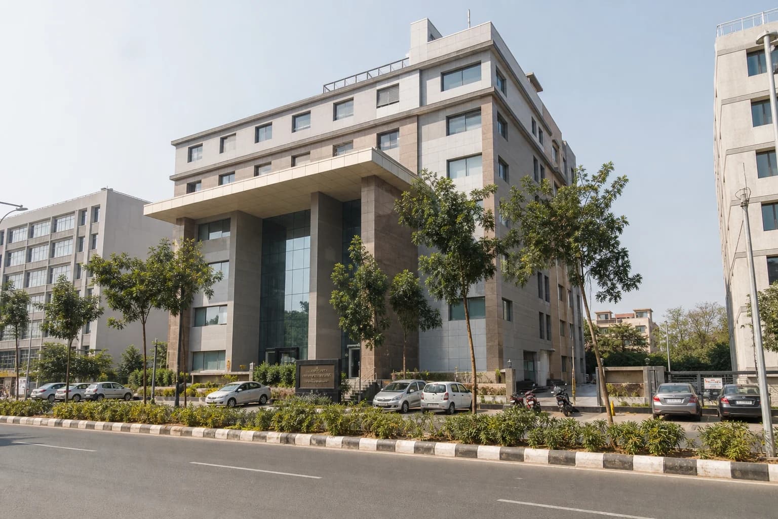 Commercial building on a wide Kudasan road