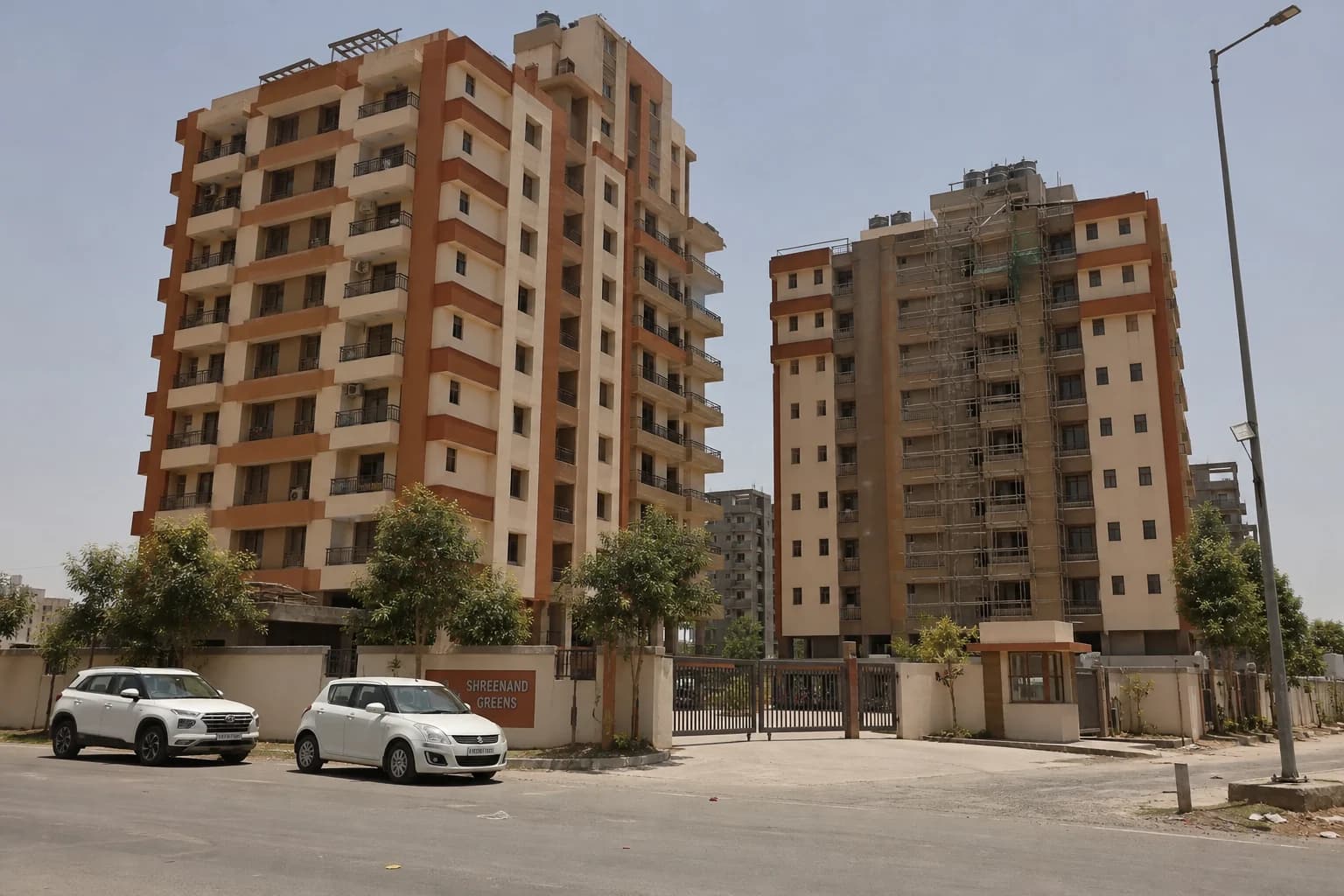 Corner towers on a 24m road in Kudasan, Gandhinagar